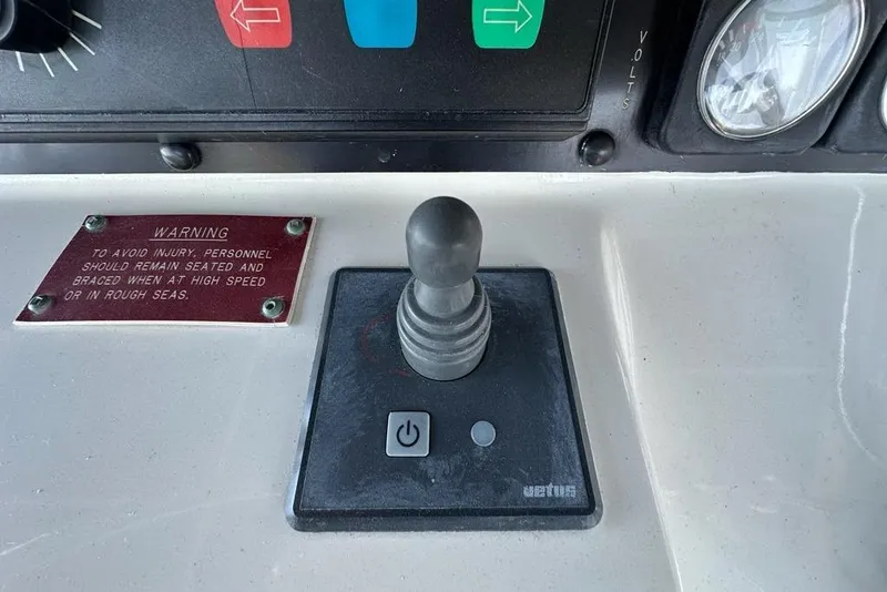 Slide: The Image of Interior view of 1988 Hatteras 48 Convertible yacht cockpit with steering wheel and seating. - 30