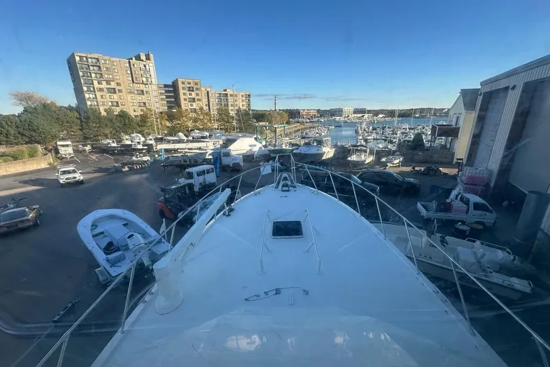 Slide: The Image of Control panel of 1988 Hatteras 48 Convertible with Raymarine display and gauges. - 34