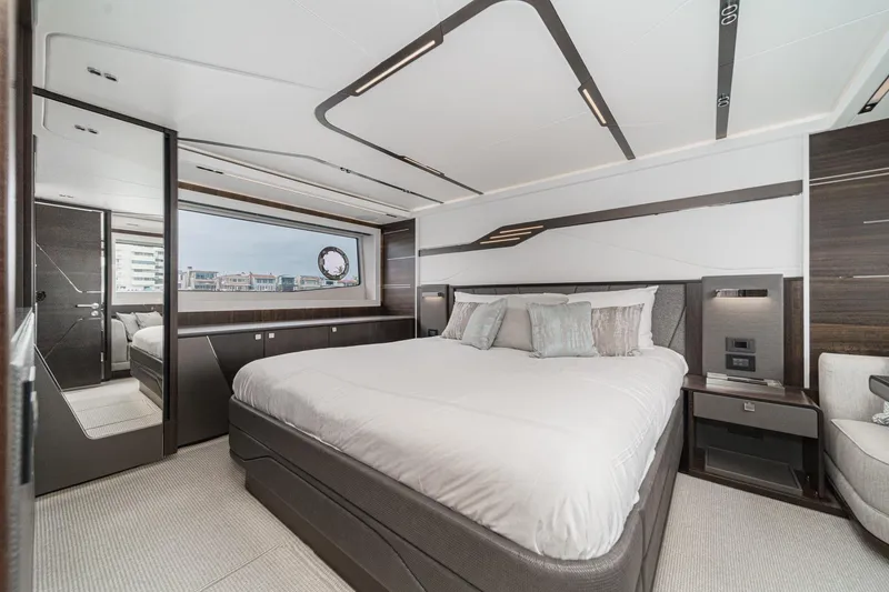 Slide: The Image of Luxurious bedroom interior of 2023 Sunseeker 65 Sport Yacht with modern design elements. - 37
