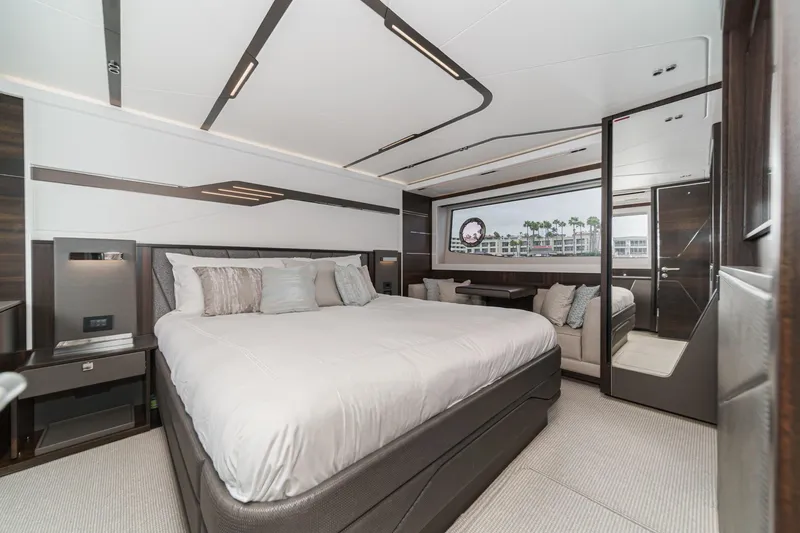 Slide: The Image of Luxurious bedroom interior of 2023 Sunseeker 65 Sport Yacht with modern design and large window. - 38