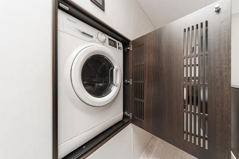 Slide: The Image of Washing machine in 2023 Sunseeker 65 Sport Yacht's interior compartment. - 51