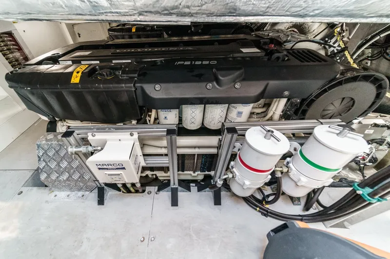 Slide: The Image of Engine room of 2023 Sunseeker 65 Sport Yacht showcasing advanced machinery. - 56