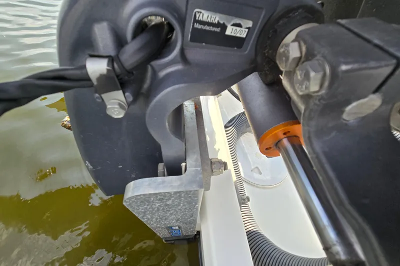 Slide: The Image of Close-up of Yamaha motor components on 2023 Jeanneau NC Sport 795 Series 2 boat. - 17