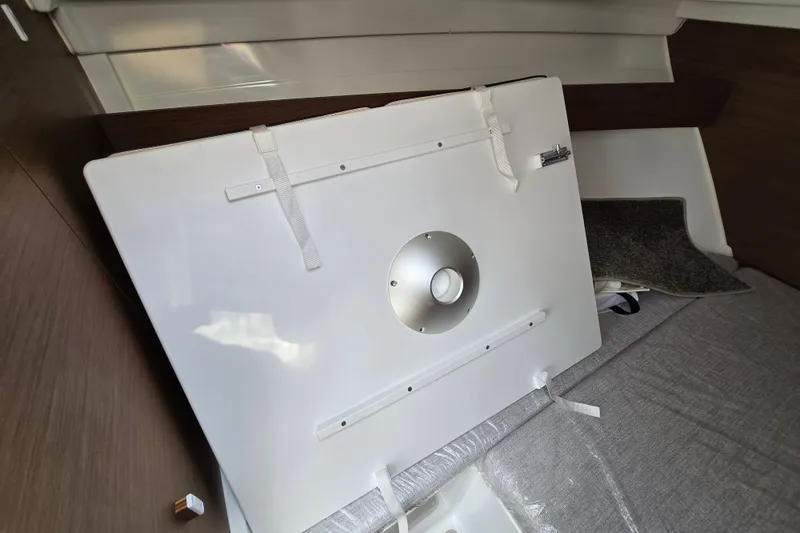 Slide: The Image of Interior of 2023 Jeanneau NC Sport 795 Series 2 boat, featuring a foldable table. - 36