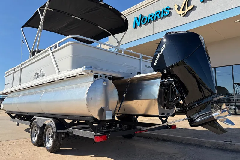 Slide: The Image of 2026 Sun Tracker Party Barge 22 RF XP3 pontoon boat with Mercury engine on trailer. - 10