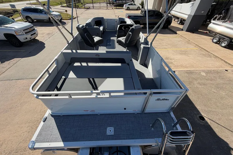 Slide: The Image of 2026 Sun Tracker Party Barge 22 RF XP3 pontoon boat with spacious seating and modern design. - 12