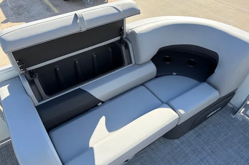 Slide: The Image of 2026 Sun Tracker Party Barge 22 RF XP3 seating with storage compartment and cup holders. - 19