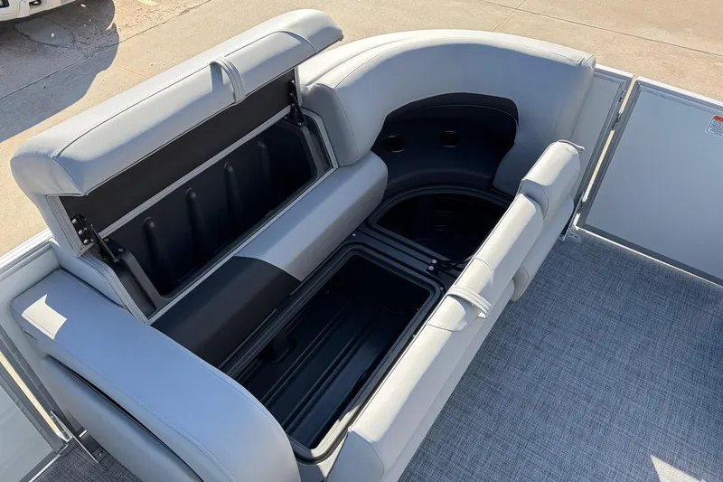 Slide: The Image of 2026 Sun Tracker Party Barge 22 RF XP3 seating with open storage compartments. - 20