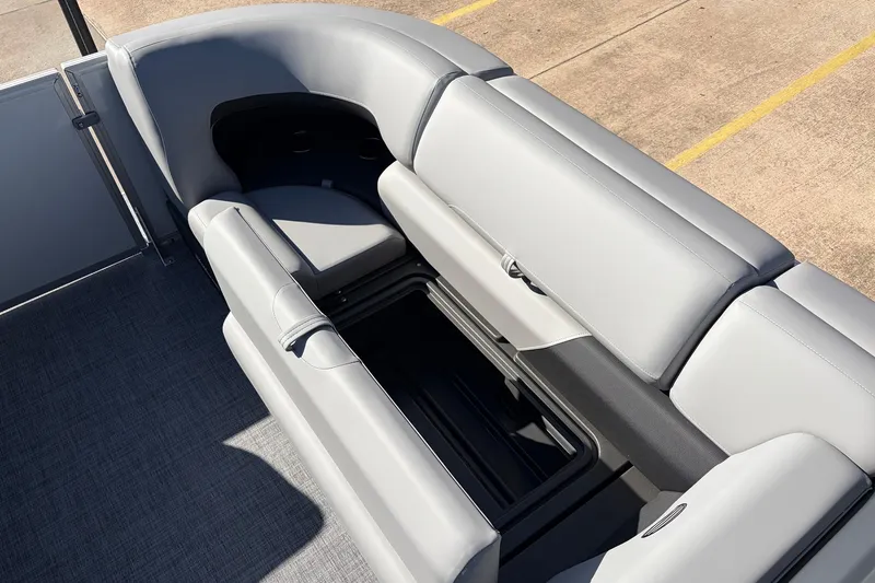 Slide: The Image of 2026 Sun Tracker Party Barge 22 RF XP3, featuring spacious seating and storage. - 23