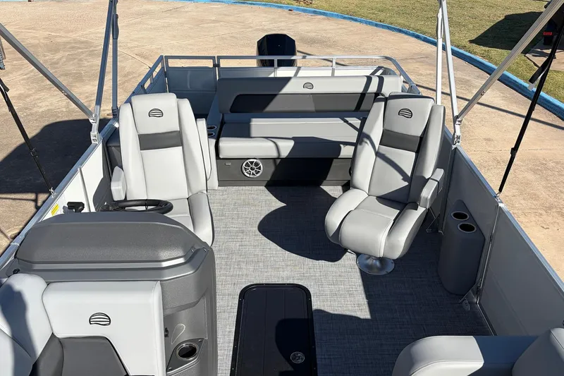 Slide: The Image of 2026 Sun Tracker Party Barge 22 RF XP3 interior with gray seating and spacious layout. - 30