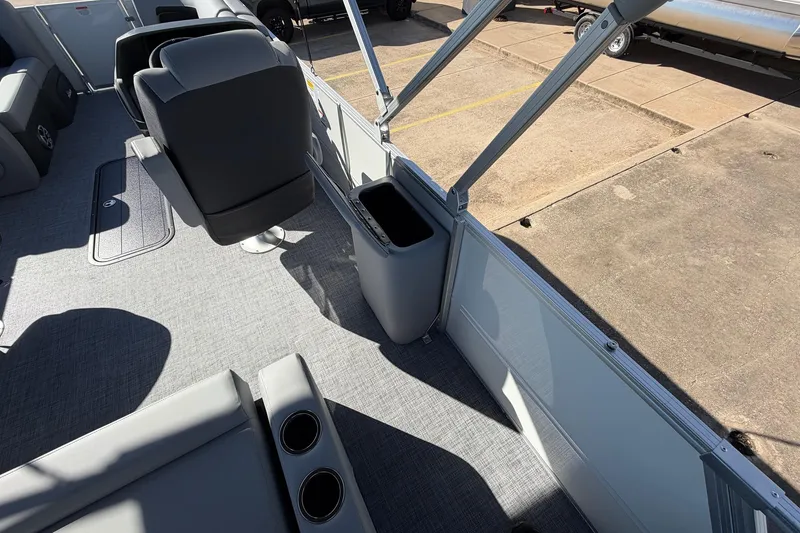 Slide: The Image of Interior of 2026 Sun Tracker Party Barge 22 RF XP3, featuring seating and cup holders. - 38