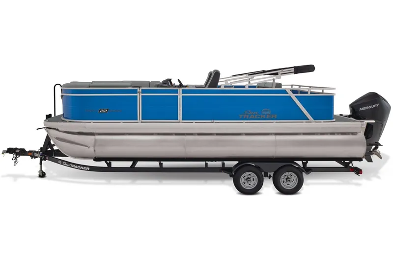 Slide: The Image of 2026 Sun Tracker Party Barge 22 RF XP3 pontoon boat on trailer at dealership. - 4
