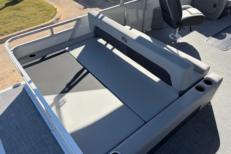 Slide: The Image of 2026 Sun Tracker Party Barge 22 RF XP3 with gray seating and cup holders. - 41