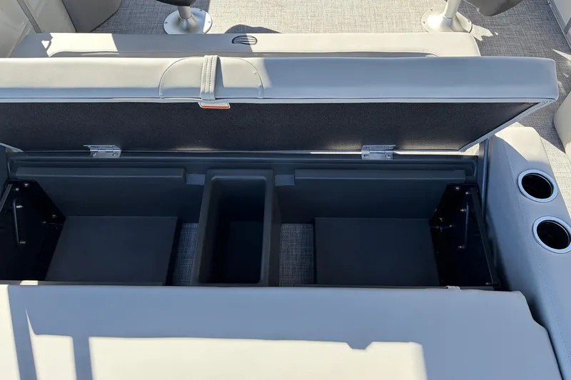 Slide: The Image of Open storage compartment on 2026 Sun Tracker Party Barge 22 RF XP3 boat. - 52
