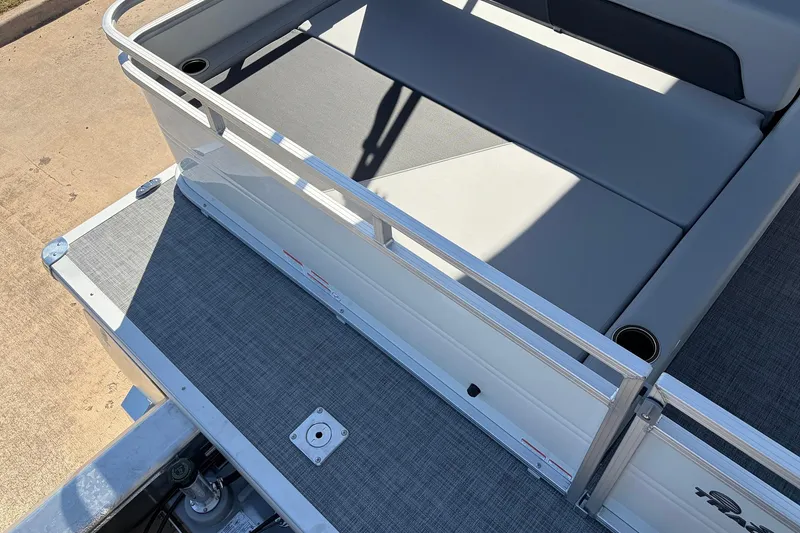 Slide: The Image of 2026 Sun Tracker Party Barge 22 RF XP3 pontoon boat with gray seating and deck. - 53