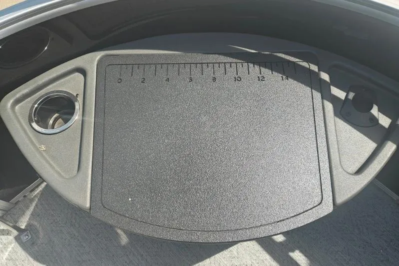 Slide: The Image of Dashboard of 2026 Sun Tracker Fishin' Barge 20 DLX with integrated ruler. - 19