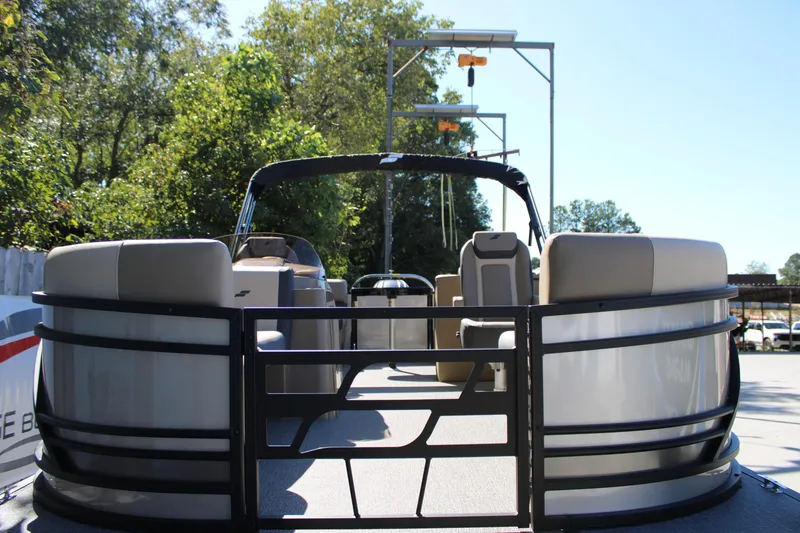 Slide: The Image of 2026 Starcraft EXS 1 pontoon boat with sleek design, spacious seating, and modern features. - 22
