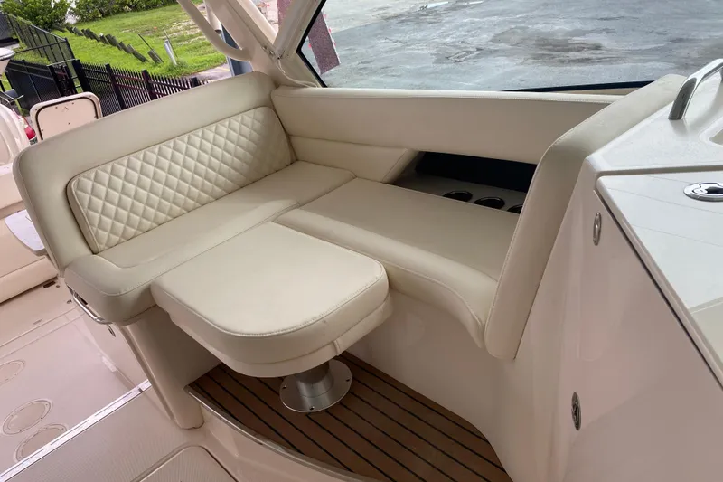 Slide: The Image of Luxurious seating area on 2025 Grady-White Freedom 345 boat with quilted upholstery. - 10