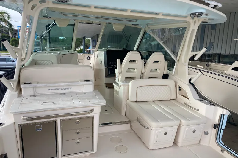 Slide: The Image of 2025 Grady-White Freedom 345 boat interior with seating and storage compartments. - 14