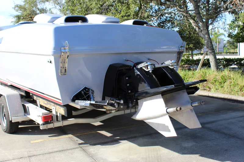 Slide: The Image of 2007 Chaudron 41 SS boat on trailer, rear view with dual propellers. - 16