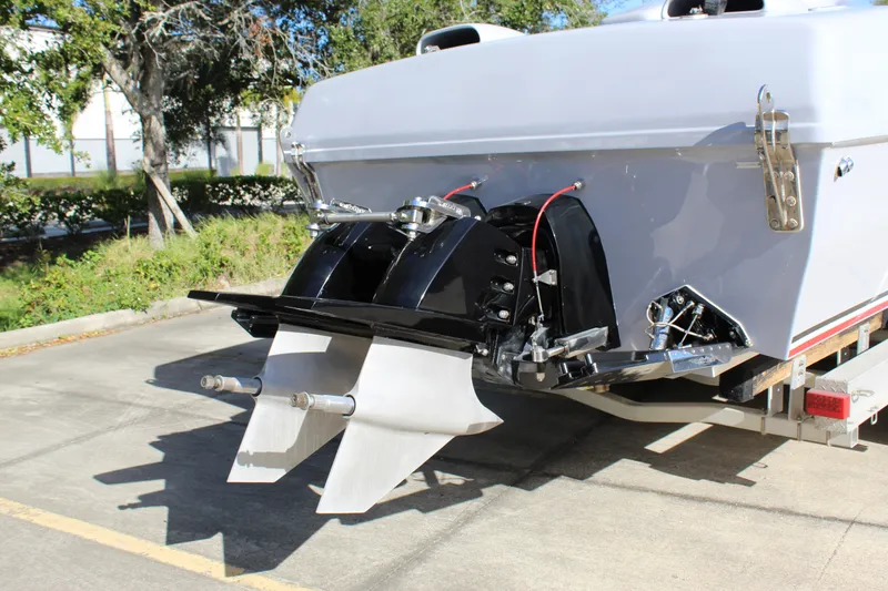 Slide: The Image of Rear view of 2007 Chaudron 41 SS boat on trailer, showcasing dual propellers. - 19