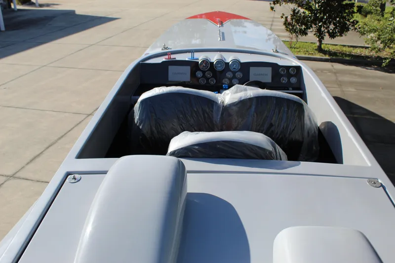 Slide: The Image of 2007 Chaudron 41 SS boat cockpit with covered seats and dashboard instruments. - 23