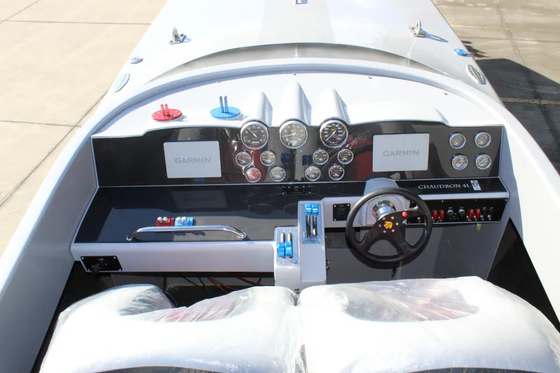 Slide: The Image of Cockpit of 2007 Chaudron 41 SS boat with Garmin displays and multiple gauges. - 26