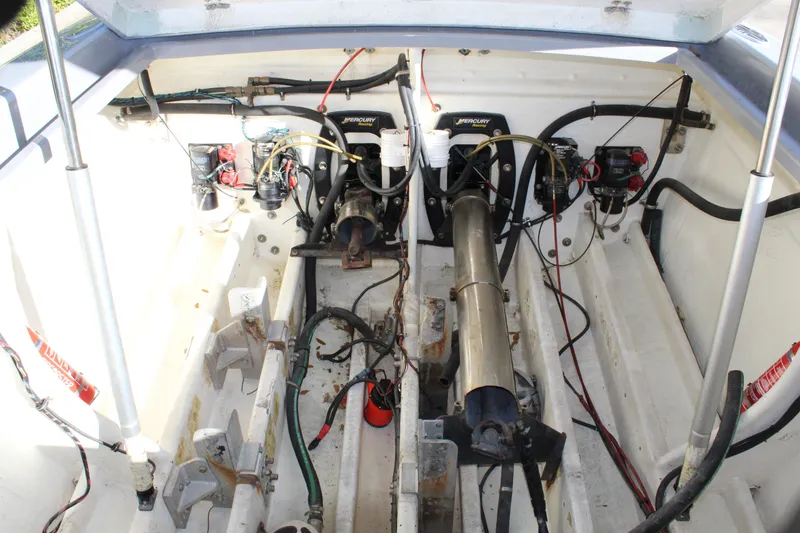 Slide: The Image of Engine compartment of a 2007 Chaudron 41 SS boat, featuring Mercury components. - 39