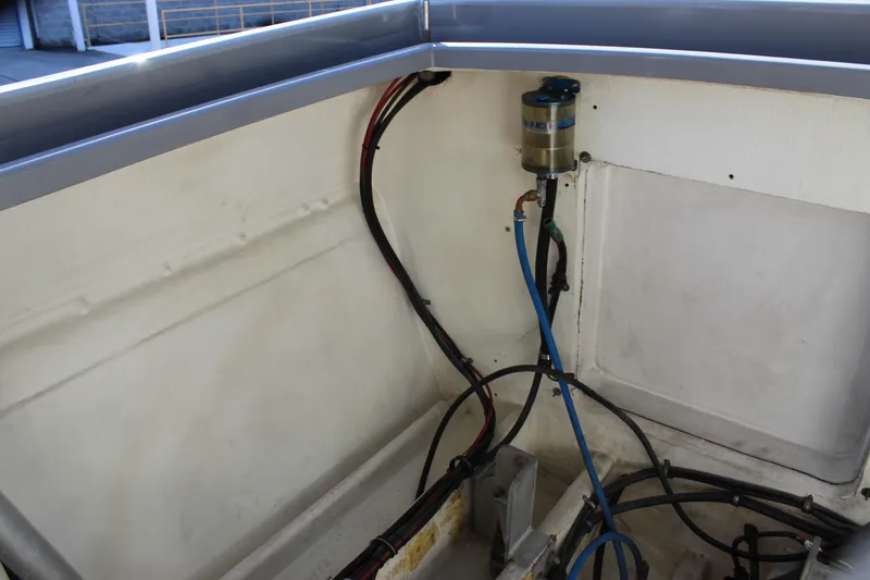 Slide: The Image of Engine compartment of 2007 Chaudron 41 SS boat with visible wiring and components. - 43