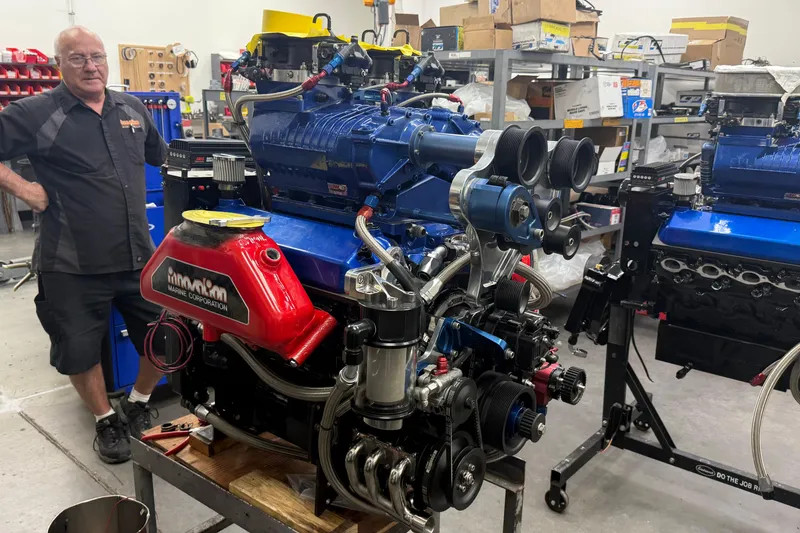 Slide: The Image of Man standing beside a Chaudron 41 SS 2007 engine in a workshop. - 44