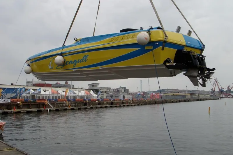 Slide: The Image of 2007 Chaudron 41 SS boat "Seagull" being lifted at a dockside crane. - 49