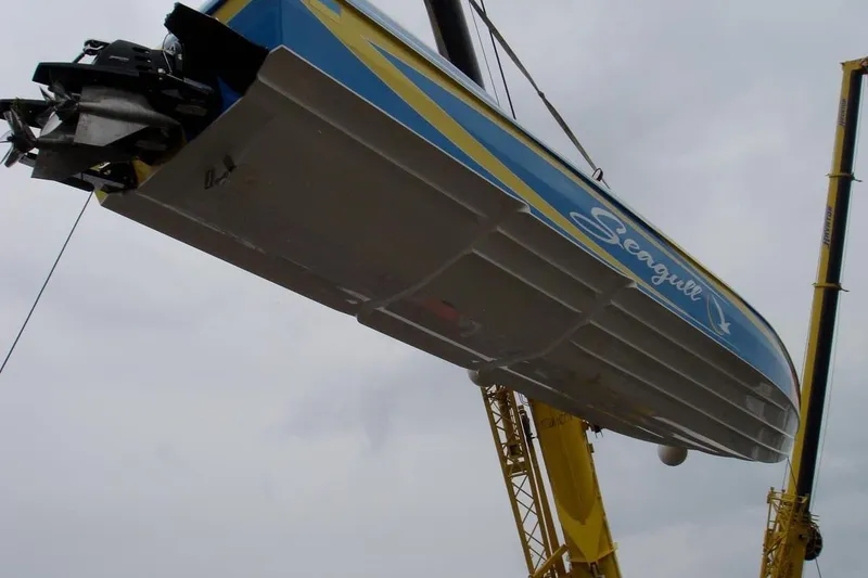 Slide: The Image of 2007 Chaudron 41 SS boat named "Seagull" being lifted by a crane. - 50