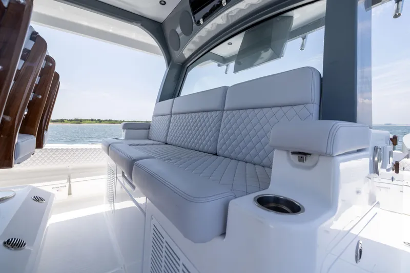 Slide: The Image of Luxurious seating on the 2026 HCB 48 Campeon boat, featuring elegant diamond-stitched upholstery. - 20