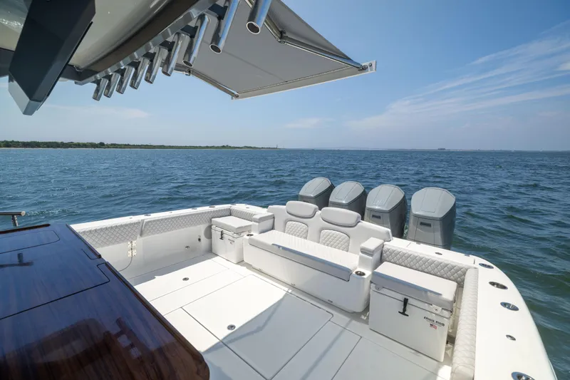 Slide: The Image of Luxury HCB 48 Campeon boat, 2026 model, with spacious deck and powerful engines on open water. - 45