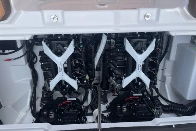 Slide: The Image of Engine compartment of a 2025 Yamaha Boats 252S, showcasing dual engines and components. - 9