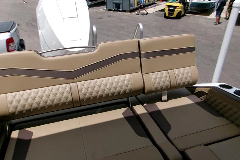 Slide: The Image of Luxurious seating on 2026 Monterey Elite 27 OB boat, featuring diamond-stitched upholstery. - 12