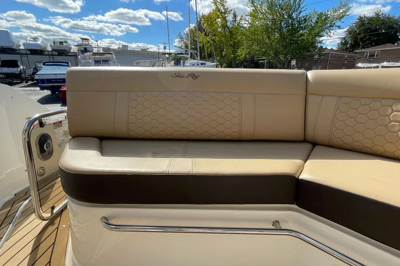 Slide: The Image of Luxurious seating on 2020 Sea Ray Sundancer 320 yacht, featuring elegant beige upholstery. - 30