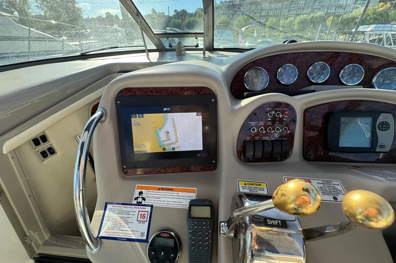 Slide: The Image of Control panel of a 2007 Sea Ray 340 Sundancer boat with navigation display. - 17
