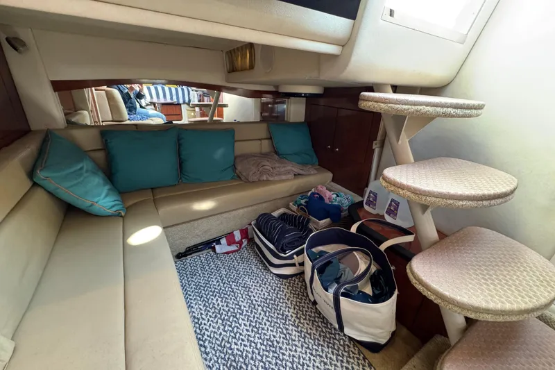 Slide: The Image of Interior of 2007 Sea Ray 340 Sundancer with cozy seating and spiral stairs. - 28