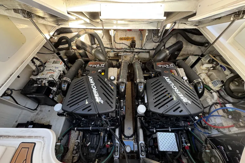 Slide: The Image of Engine room of 2007 Sea Ray 340 Sundancer with twin Mercury engines. - 33