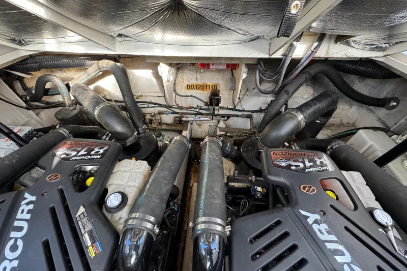 Slide: The Image of Engine compartment of a 2007 Sea Ray 340 Sundancer with twin Mercury 8.1S Horizon engines. - 34