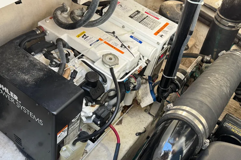 Slide: The Image of Engine compartment of a 2007 Sea Ray 340 Sundancer with Kohler power systems. - 35