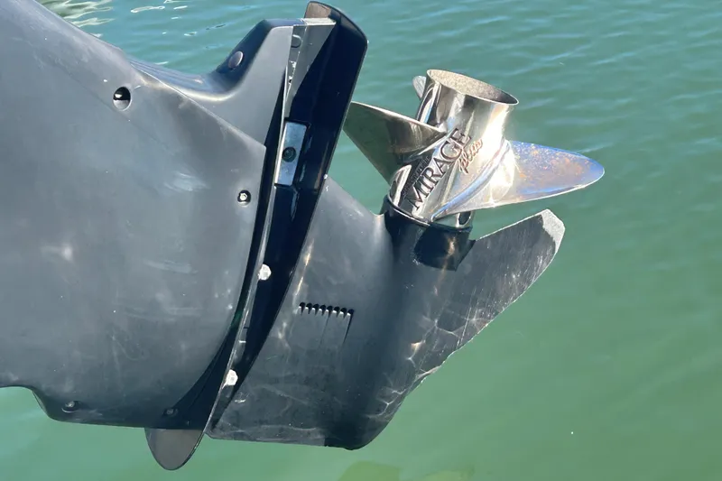 Slide: The Image of Close-up of a 2006 Boston Whaler 210 Ventura boat propeller in water. - 15