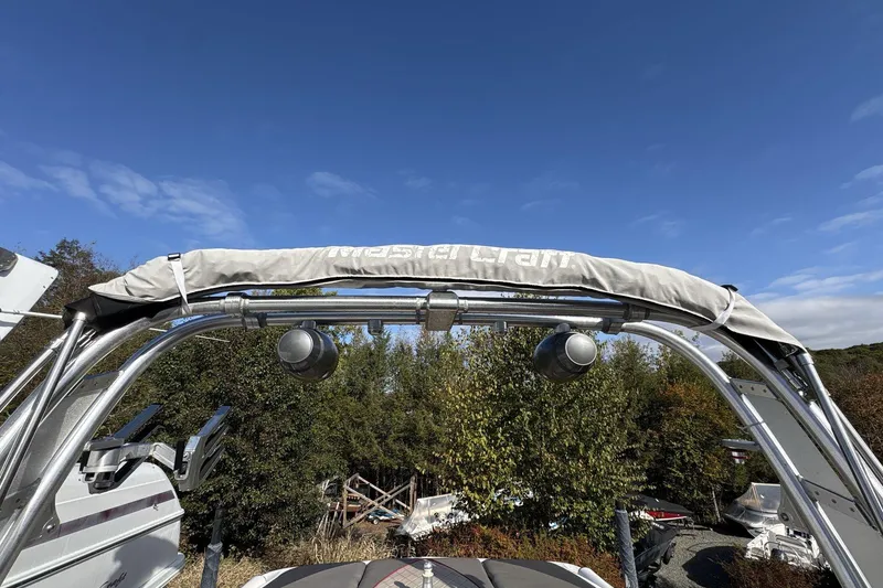 Slide: The Image of 2012 MasterCraft X-15 boat tower with speakers against a clear blue sky. - 13