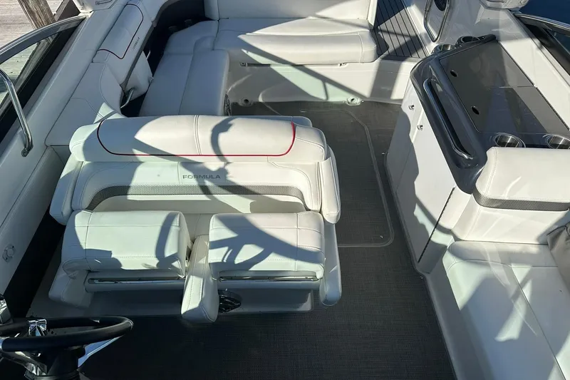 Slide: The Image of Interior of 2018 Formula 290 Sun Sport boat, white upholstery. - 14