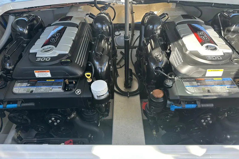 Slide: The Image of Twin Mercury engines in a 2018 Formula 290 Sun Sport boat. - 22