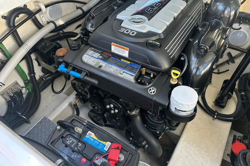 Slide: The Image of Engine compartment of a 2018 Formula 290 Sun Sport boat, featuring a Mercury 6.2L engine. - 23