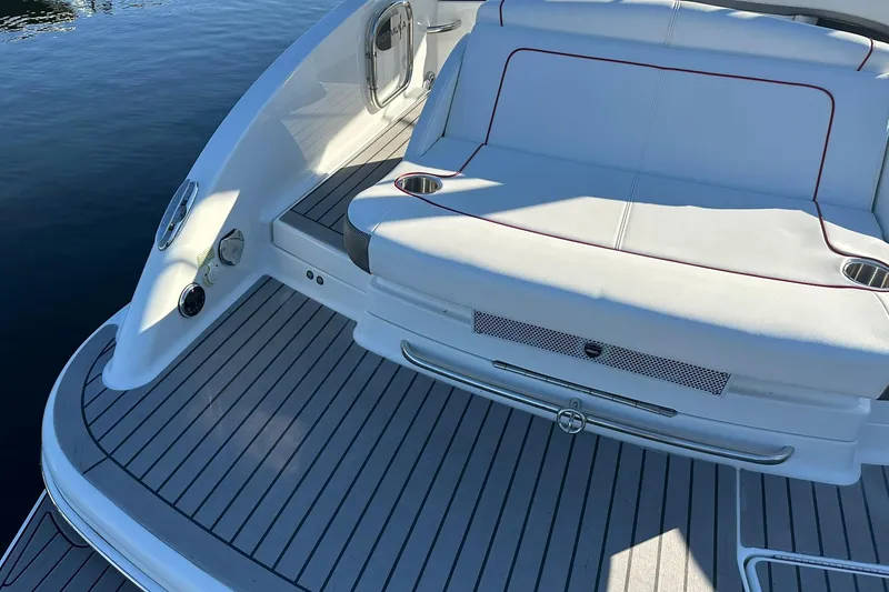 Slide: The Image of 2018 Formula 290 Sun Sport boat with sleek white seating and teak deck. - 5