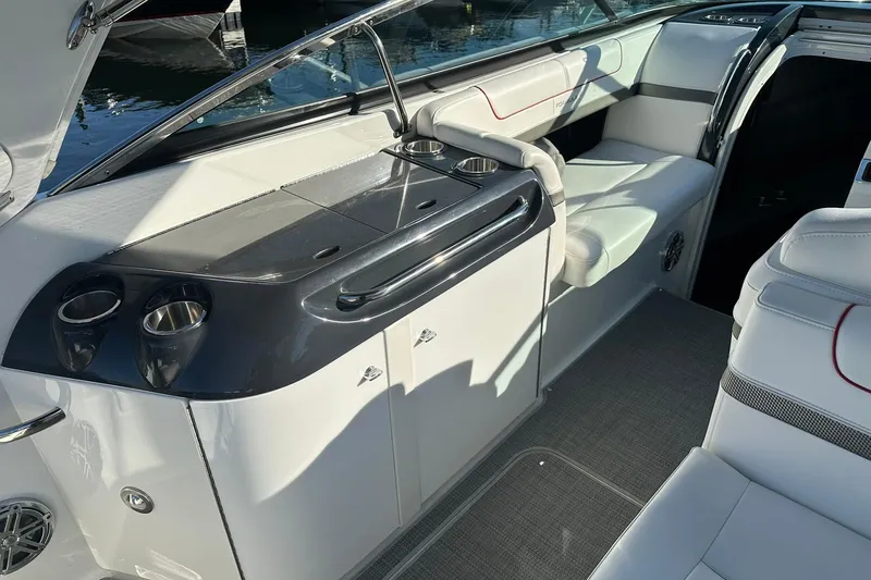 Slide: The Image of Interior of a 2018 Formula 290 Sun Sport boat with sleek seating and modern amenities. - 9