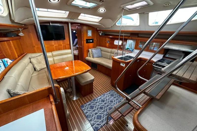 Slide: The Image of Luxurious interior of 2006 Hunter 45 CC yacht with wood finishes and modern amenities. - 14